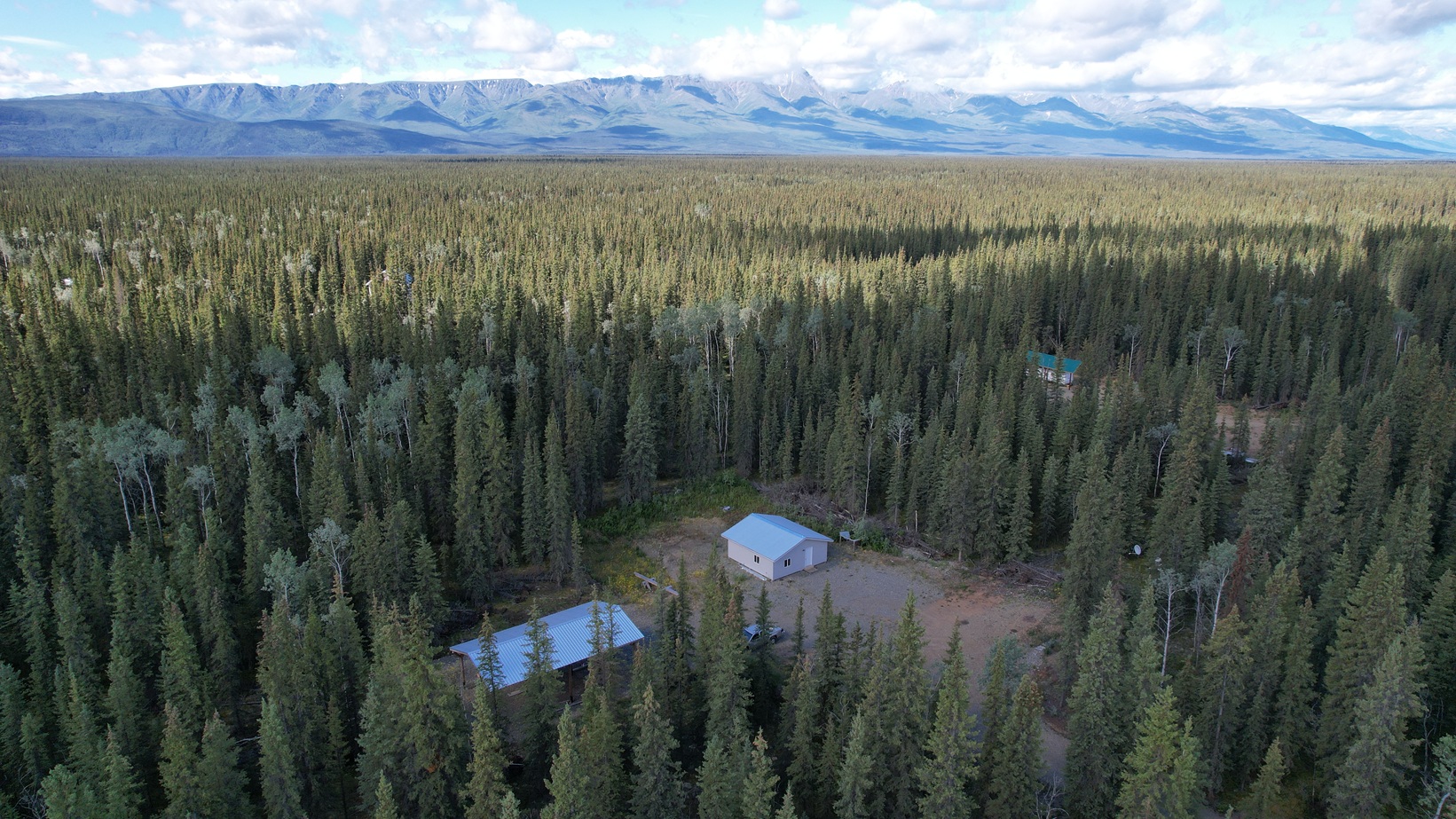 Featured image for “Off-Grid Cabin for Sale in Tok Alaska | Homestead Cabin with Pole Barn & No Property Taxes $155K”